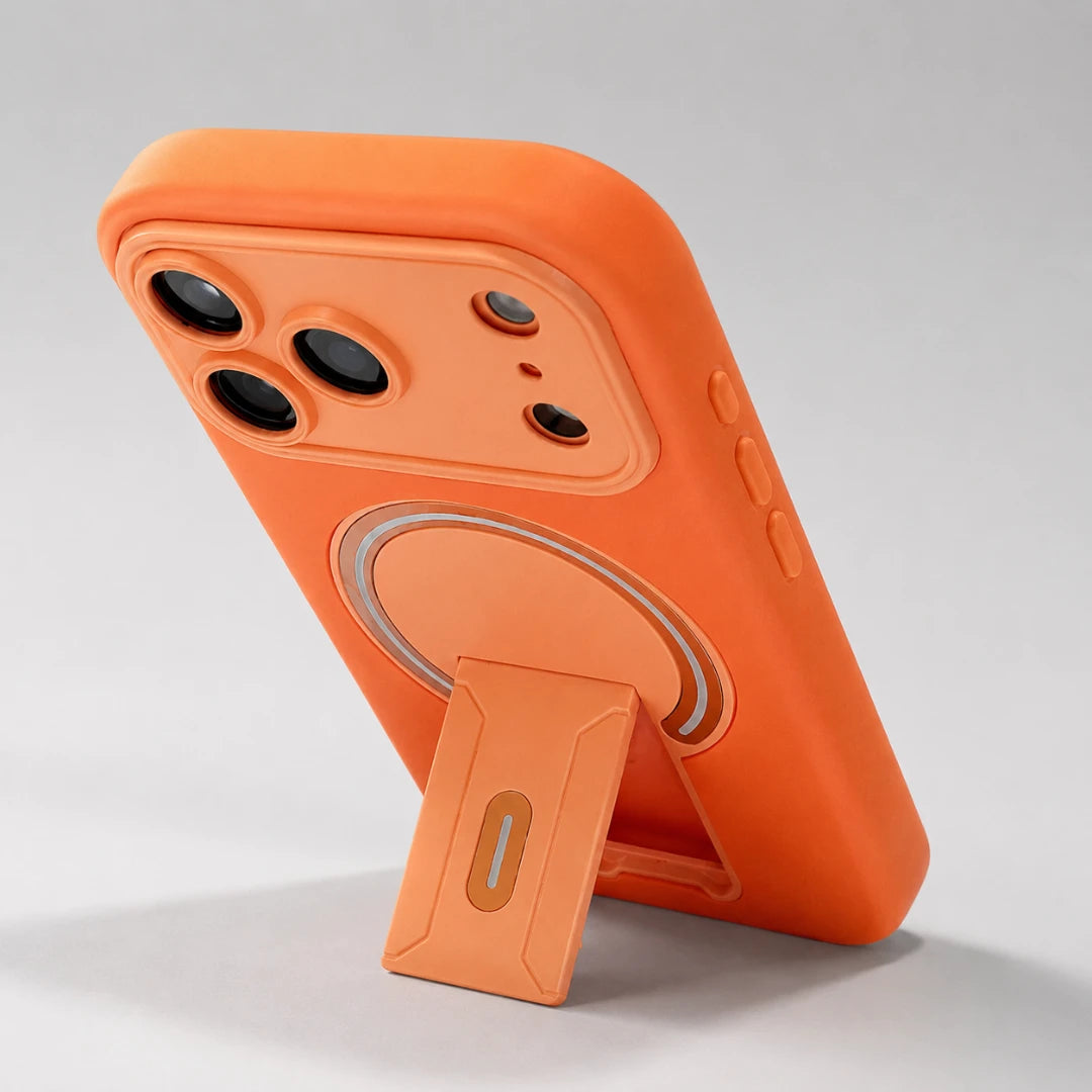 Josh & Tate - TiltPod™ iPhone Case - An orange protective phone case with a built-in kickstand, shown from a rear three-quarter angle on a light gray background.