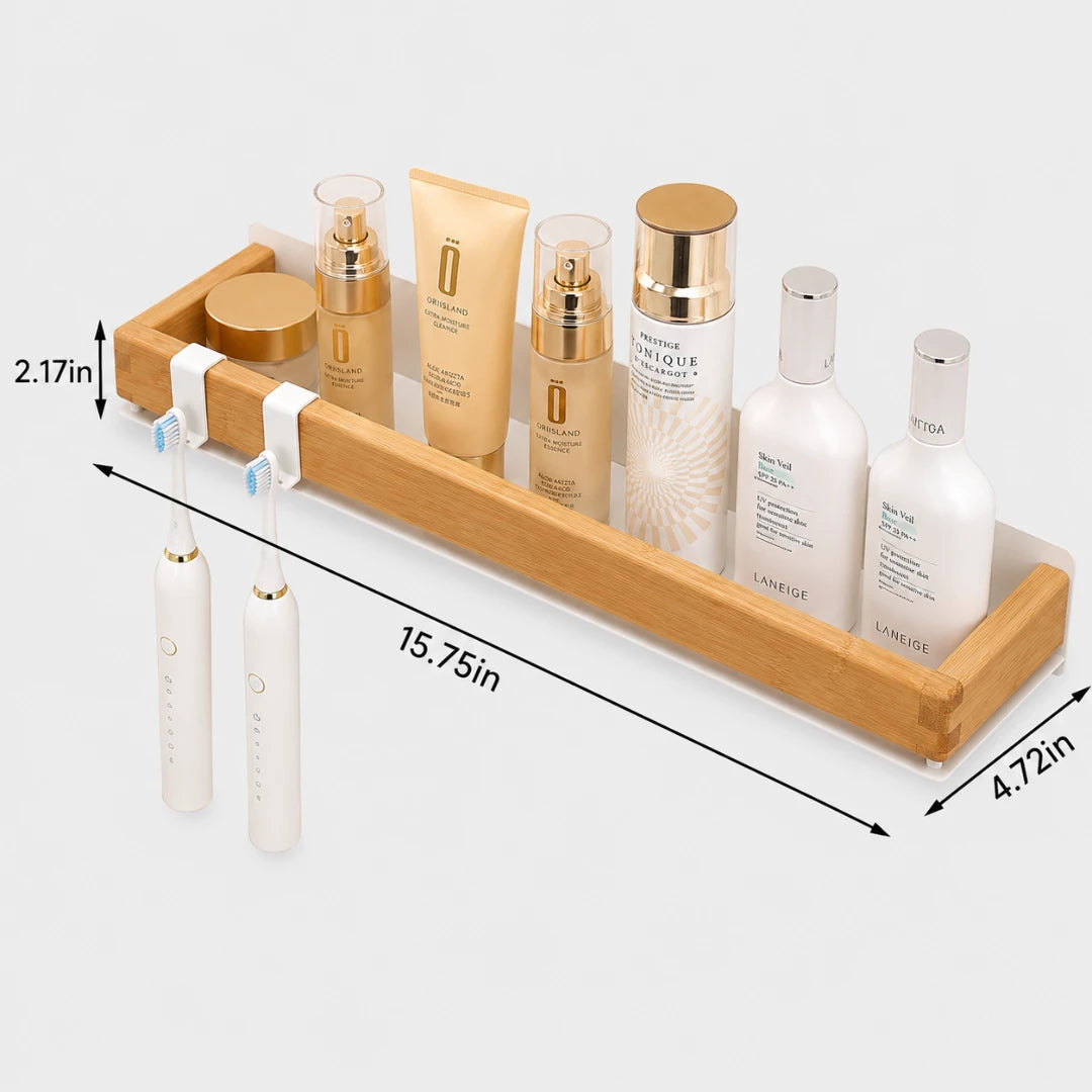 Josh & Tate - TimberLedge™ Wall Organizer - A bamboo bathroom organizer tray holding toiletry bottles, a toothbrush holder, and two electric toothbrushes, shown with dimension lines and measurements on a light gray background.