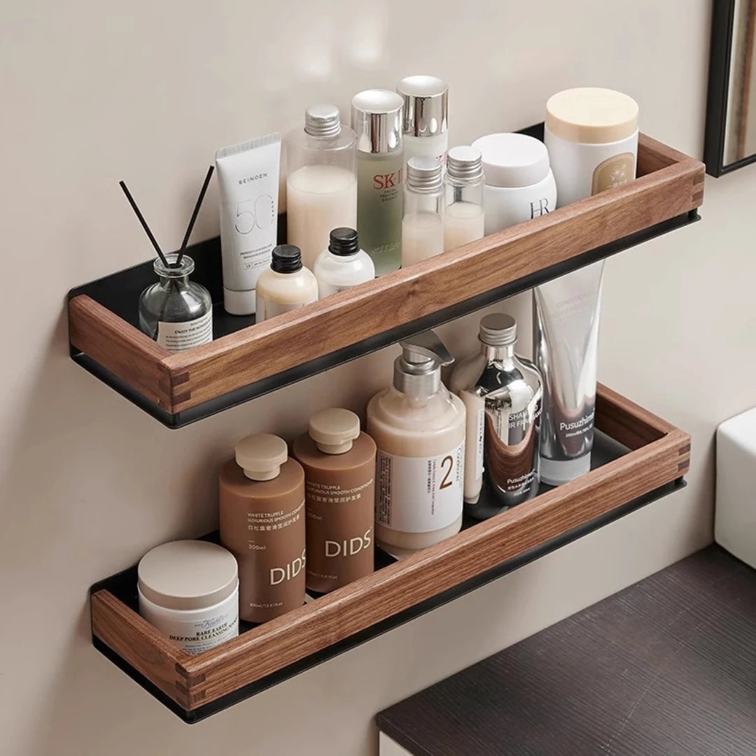 Josh & Tate - TimberLedge™ Wall Organizer - Wooden shelf with various skincare products on a neutral wall.