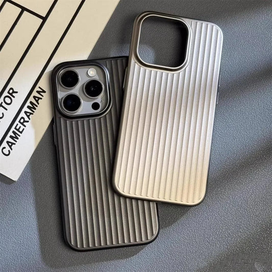Two phone cases with ribbed texture on a gray surface