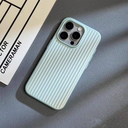 Light blue phone case on a textured surface with a camera lens visible