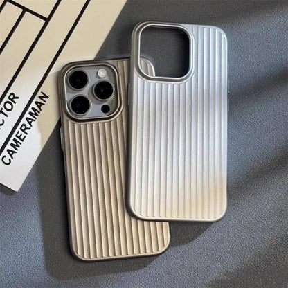 Two phone cases with ribbed texture on a gray surface