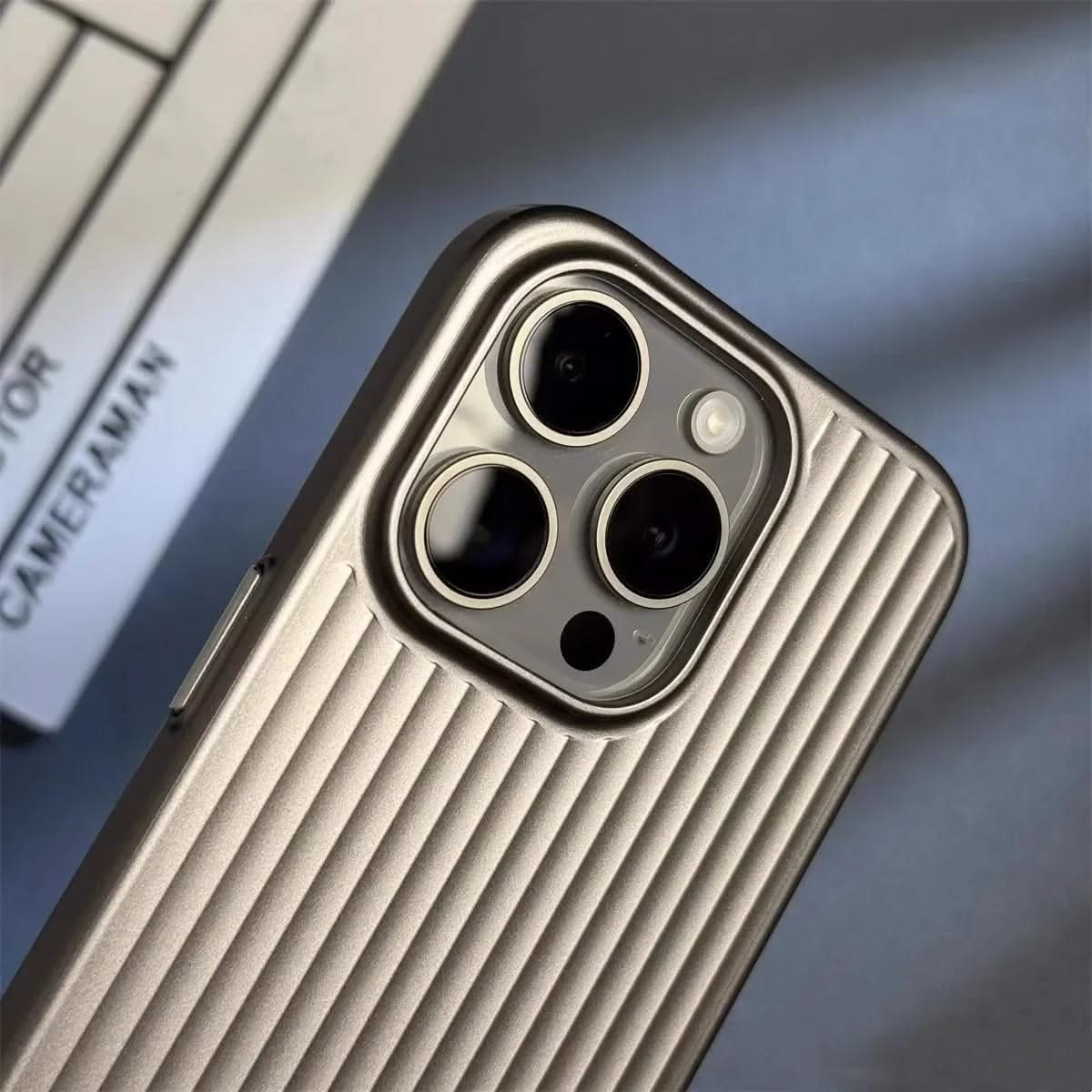 Phone case with camera lens on a blurred background
