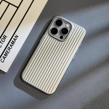 Phone case with ribbed design on a textured surface