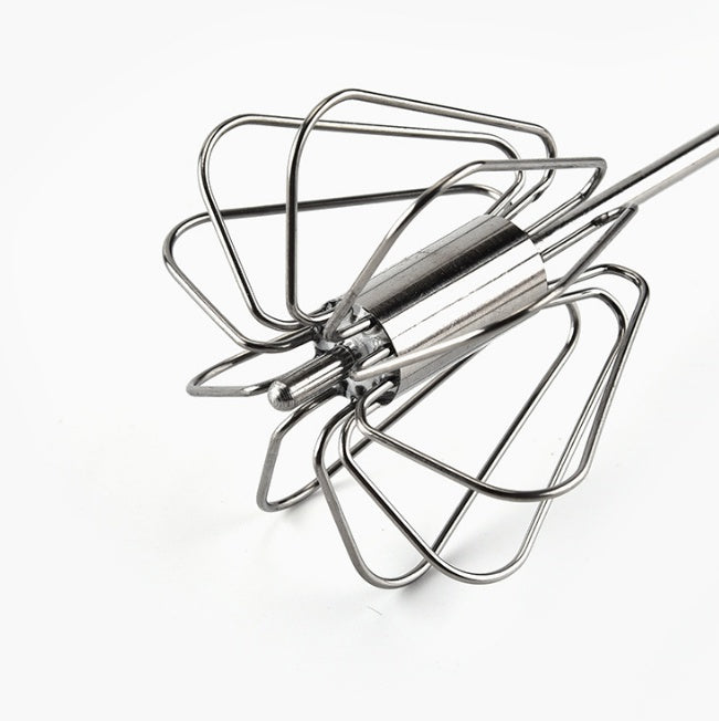 Josh & Tate - TwistBeat™ Push-Spin Egg Whisk - Metal whisk on a white background