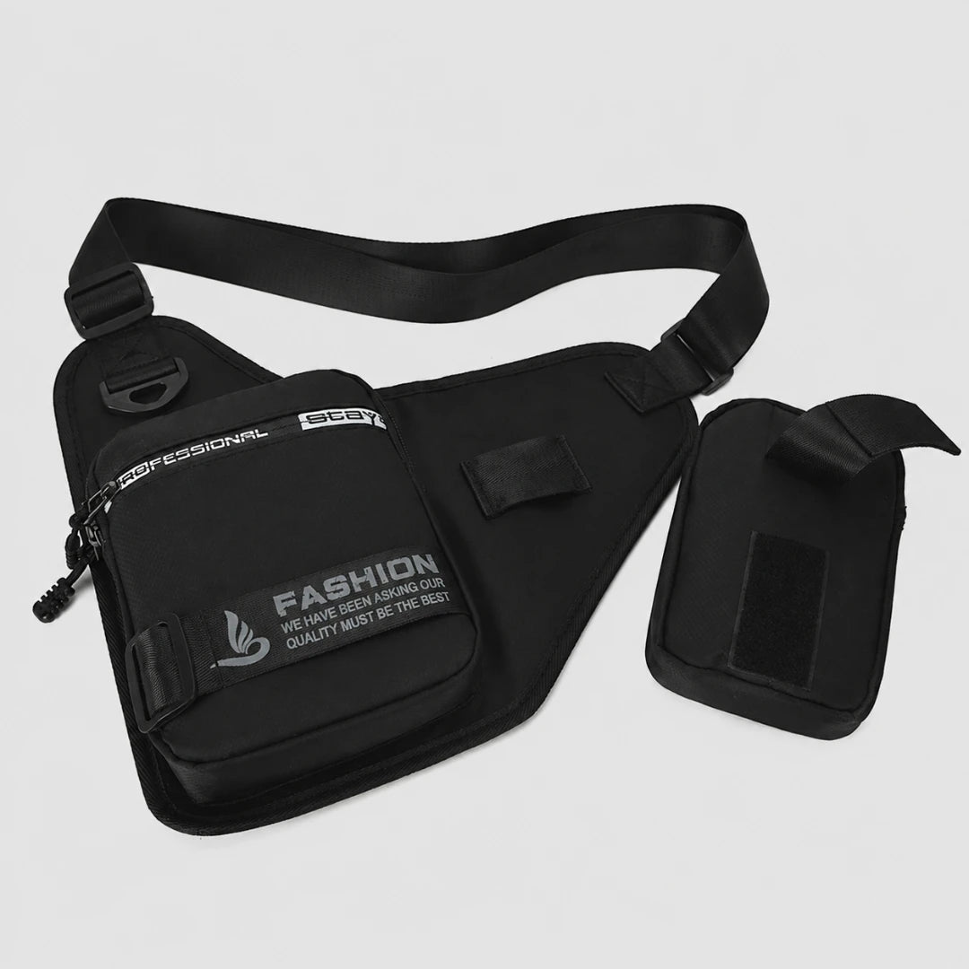 Josh & Tate - UrbanCore™ Crossbody Bag - Black tactical-style crossbody bag with an adjustable shoulder strap, front zip pocket, and detachable pouch, shown on a light gray background.