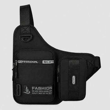 Josh & Tate - UrbanCore™ Crossbody Bag - A black sling shoulder bag with multiple zippered pockets and white printed text, shown against a light gray background.