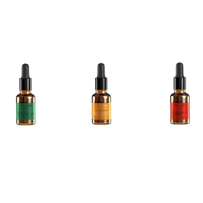 Three dropper bottles with different colored labels on a white background