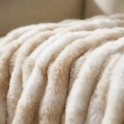 Josh & Tate - VelvetRib™ Faux Fur Throw Blanket - Close-up of a beige blanket with soft texture