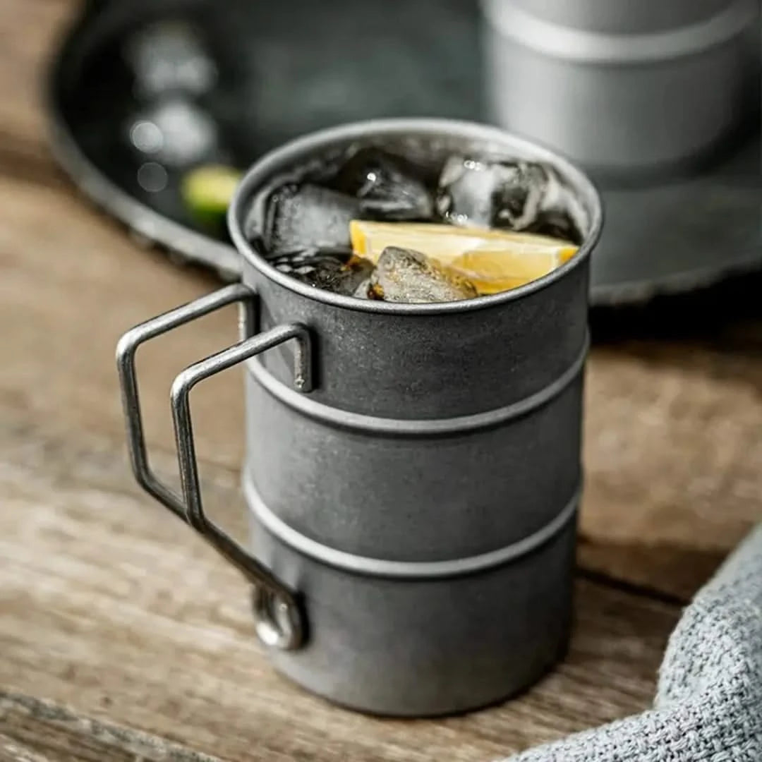 Josh & Tate - Vintage Steel Mug (13oz / 380mL) - Gray metal cup with ice and lemon on a wooden surface