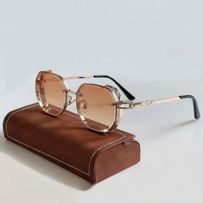 Sunglasses with gold frame and brown lenses on a brown stand against a light gray background