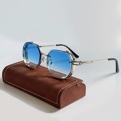 Sunglasses with blue gradient lenses on a brown leather case against a light gray background