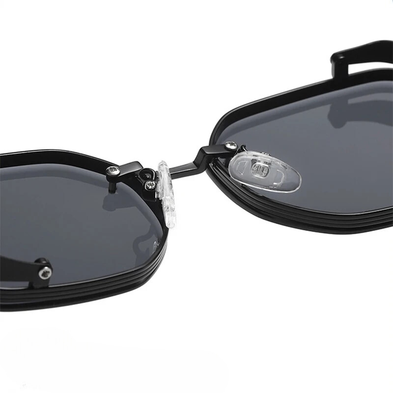Black sunglasses with a reflective lens on a white background