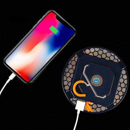 Wireless charging pad with smartphone on a black background