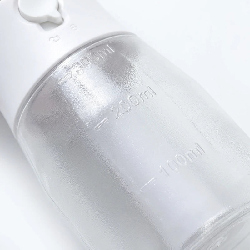 Josh & Tate - WalkPod™ 3-in-1 Dog Travel Bottle - Close-up of a white water bottle with measurement markings on a light gray background
