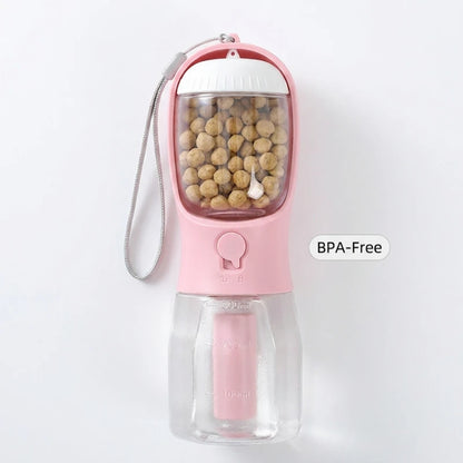 Josh & Tate - WalkPod™ 3-in-1 Dog Travel Bottle - Pink pet water bottle with transparent section showing food on a white background