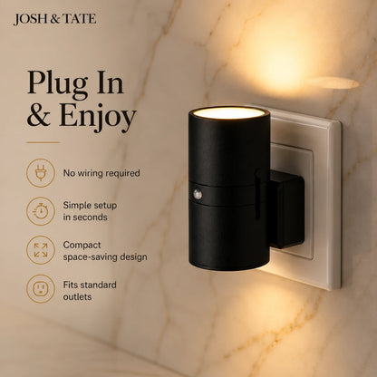 Josh & Tate - WallBeam™ Plug-In Directional Sconce - Black wall light fixture with 'Josh & Tate' branding on a marble wall.