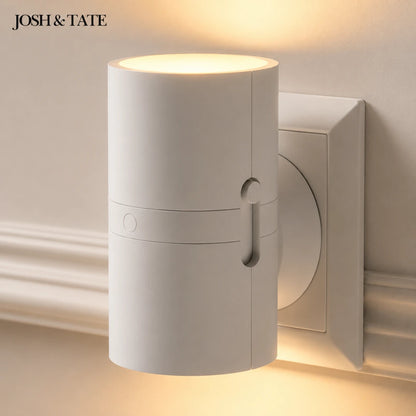 Josgh & Tate -  WallBeam™ Plug-In Directional Sconce - White cylindrical wall light fixture on a neutral background with 'JOSH & TATE' branding.