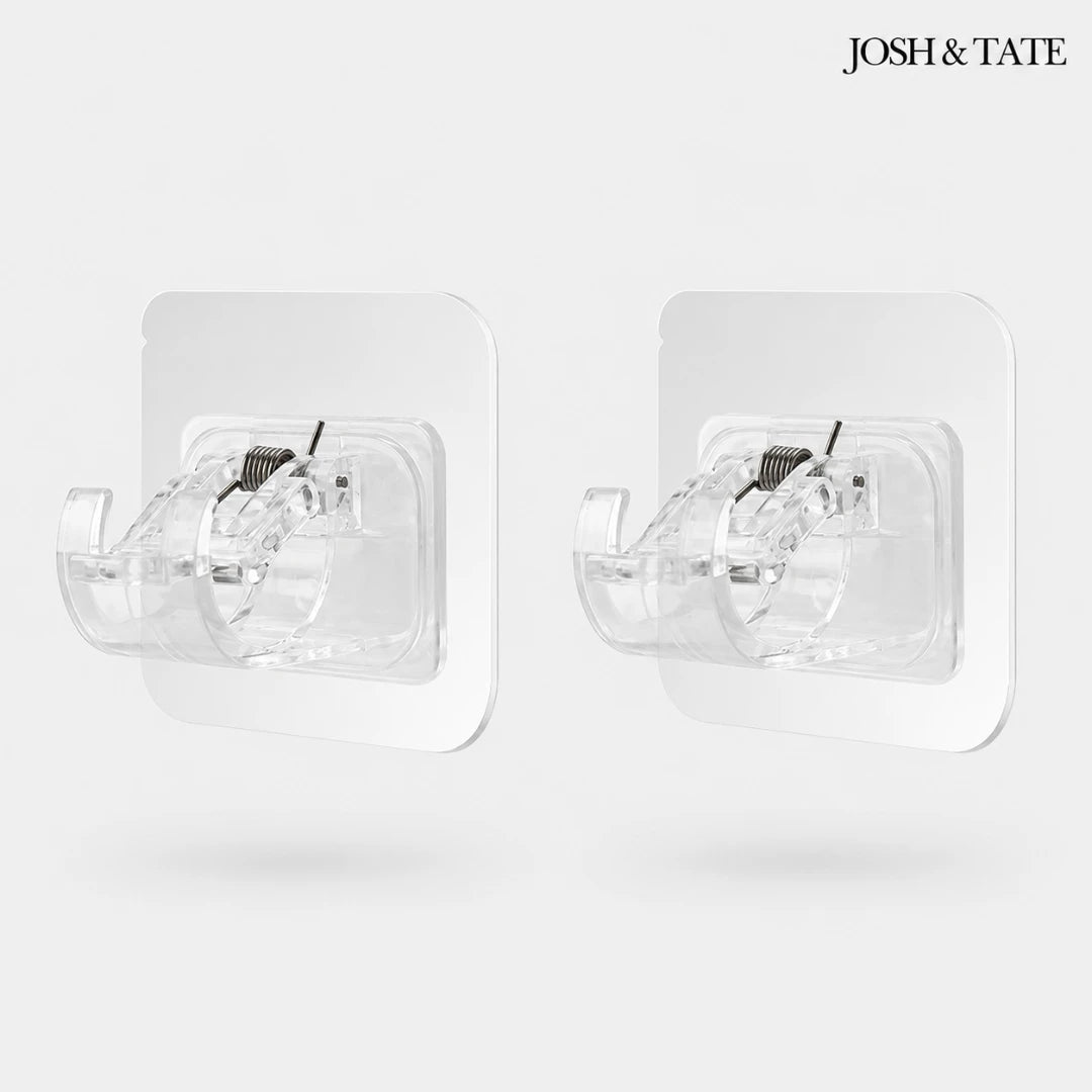 Josh & Tate - WallGrip™ Adhesive Rod Clip - Two clear wall-mounted fans with black blades on a white background, branded 'Josh & Tate'.