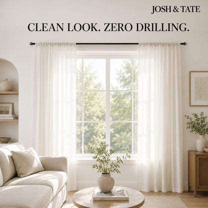 Josh & Tate - WallGrip™ Adhesive Rod Clip - Living room with white curtains and 'Josh & Tate' branding.
