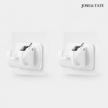 Josh & Tate - WallGrip™ Adhesive Rod Clip - White wall hooks with black metal clips on a white background, featuring the brand 'Josh & Tate'.