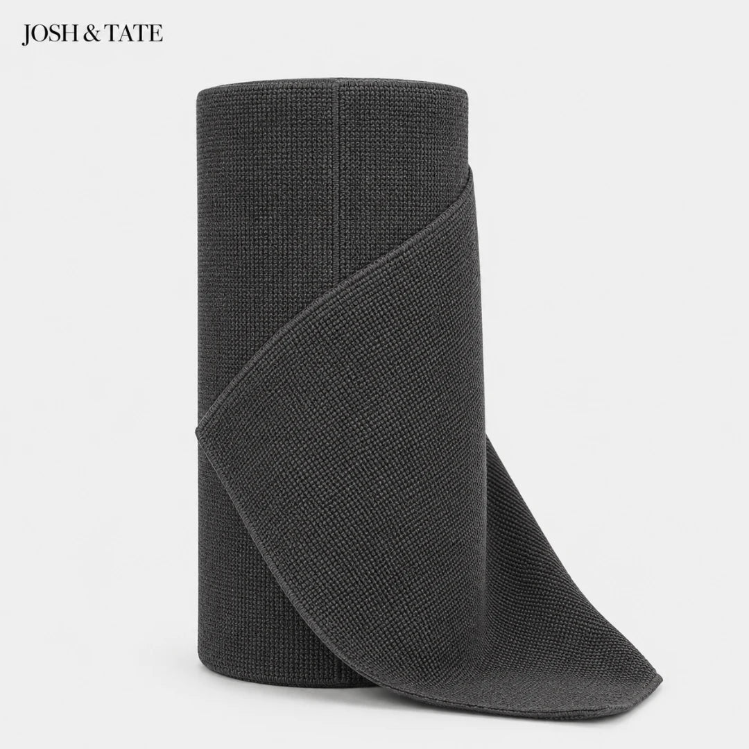 Josh & Tate - WipeRoll™ Reusable Microfiber Cleaning Cloths - Dark gray textured ankle boot on a light gray background with 'JOSH & TATE' branding.