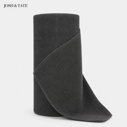 Josh & Tate - WipeRoll™ Reusable Microfiber Cleaning Cloths - Dark gray textured ankle boot on a light gray background with 'JOSH & TATE' branding.