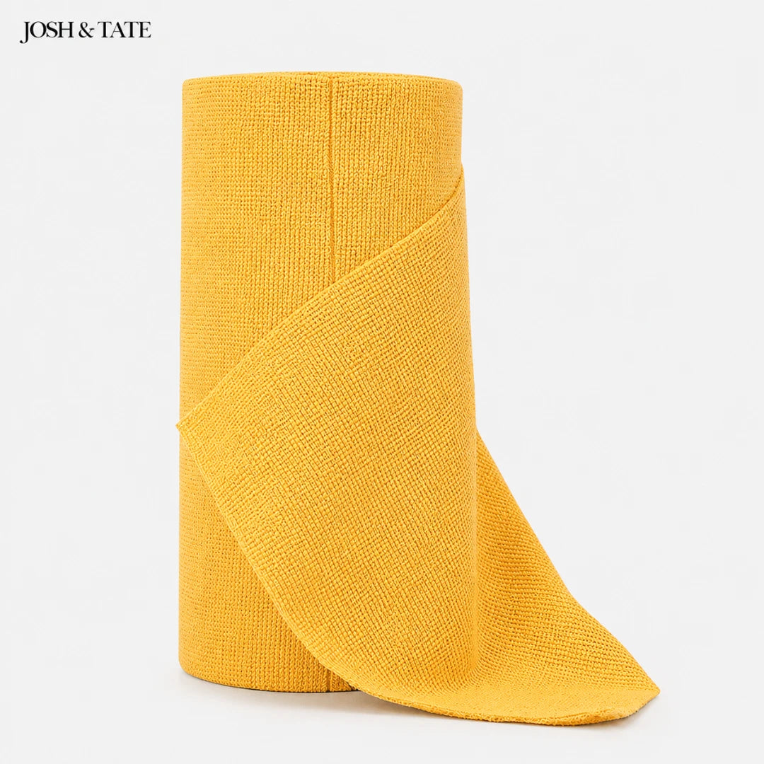Josh & Tate - WipeRoll™ Reusable Microfiber Cleaning Cloths - Yellow sock with a textured pattern on a white background, featuring the brand 'Josh & Tate'.