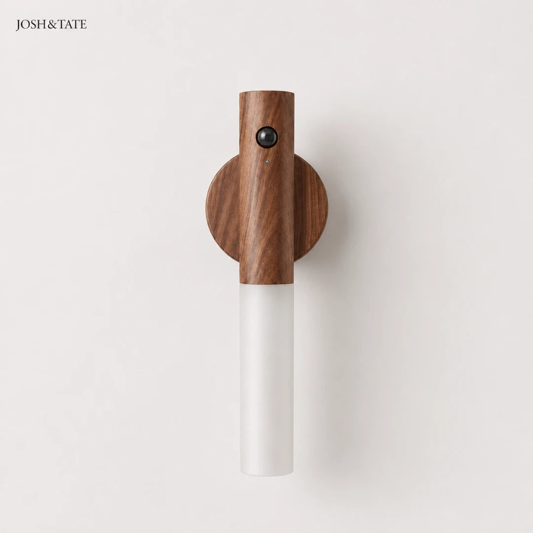 Josh & Tate - WoodGlow™ Magnetic Sensor Night Light - Wall-mounted lamp with wooden top and white base on a light gray background, branded 'JOSH&TATE'.