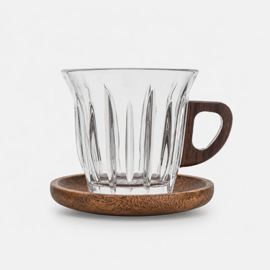 Josh & Tate - WoodGrip™ Coffee Cup Set - Clear ribbed glass cup with a dark brown wooden handle, resting on a matching round wooden coaster against a light gray background.