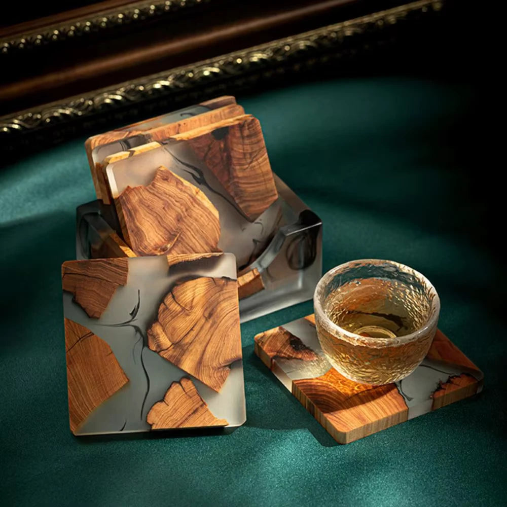 Set of wooden coasters with a glass of whiskey on a green surface