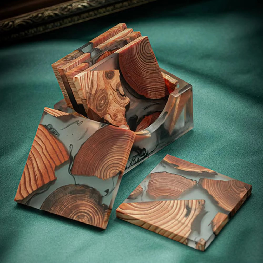 Wooden coasters with a geometric design on a teal surface
