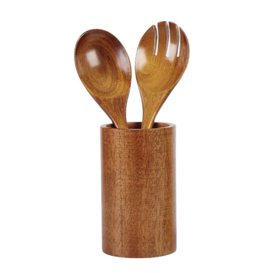 Wooden spoon and fork set in a cylindrical wooden holder on a white background
