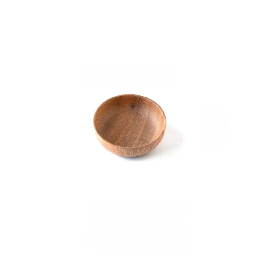 Wooden bowl on a white background