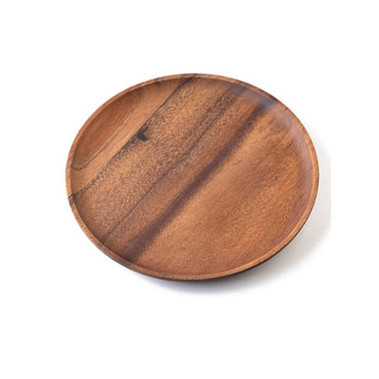 Wooden plate on a white background