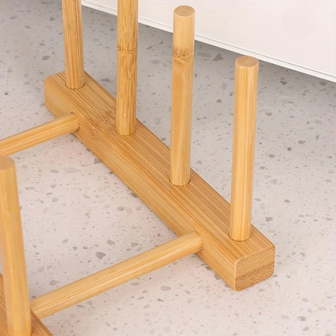 Wooden stand with cylindrical posts on a concrete floor