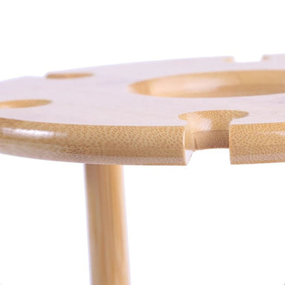 Close-up of a wooden stool with a white seat on a white background